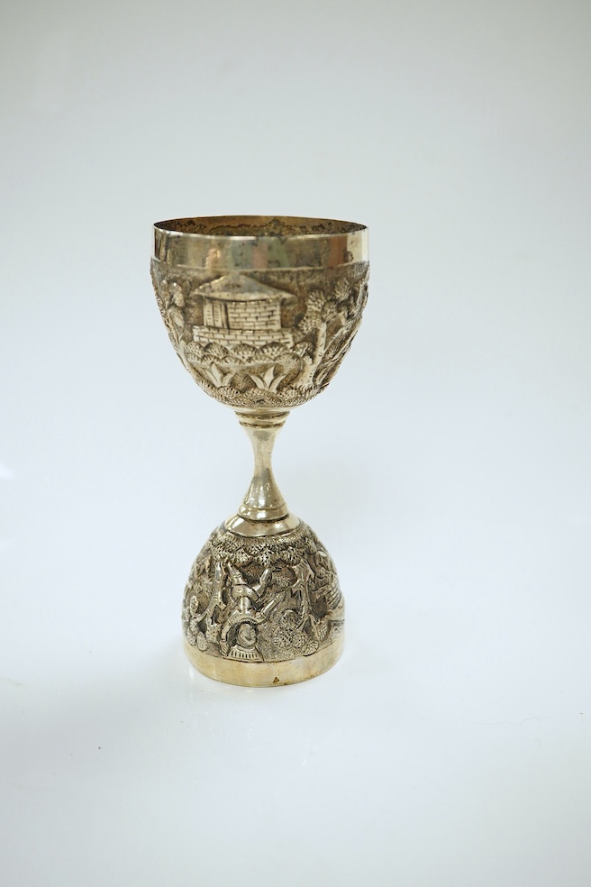 A group of assorted small silver and white metal wares including a white metal posy holder and an Indian white metal measuring cup, 9.5oz of hallmarked silver. Condition - fair to good.